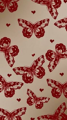 red and white butterflies with hearts on them wallpaper in a living room or bedroom