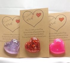 three valentine's day cards with two hearts and one has a message on it