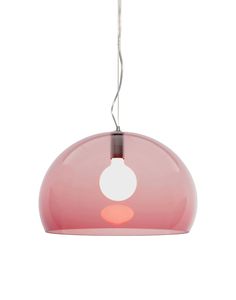 a pink light hanging from a ceiling fixture