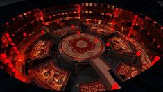 an overhead view of a circular room with red lights