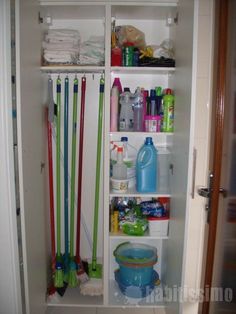 the closet is filled with cleaning products and supplies