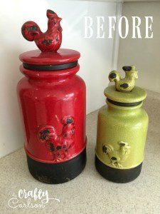 two red and green canisters sitting next to each other on a counter top