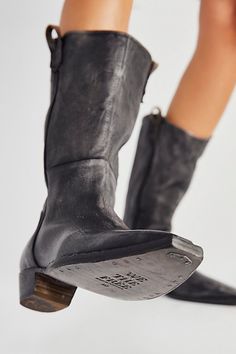 So classically cool, western-inspired boots featured in a pull-on style and distressed leather with a bold pointed toe, minimal block heel, and pull loop detailing. * Cushioned insole * Unique studded sole Cowboy Boots With Dress, Boots With Dress, Distressed Boots, Relaxed Jeans, Women Boots, Distressed Leather, Romper Pants, Buy Shoes, Black Fits