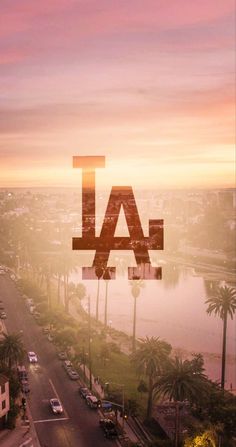 an aerial view of a city with palm trees and the word la in front of it