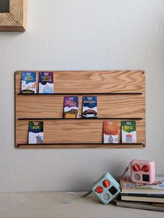 a wooden book rack with books on it