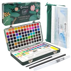 the watercolor paint set is open and ready to be used