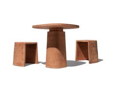 three concrete pedestals and one round table are shown in front of a white background