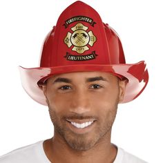 a man wearing a red firefighter hat