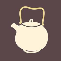 a white teapot with a yellow handle on a brown background