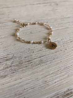 PLEASE INCLUDE BABIES WRIST MEASUREMENT AND  AGE AT CHECKOUT. OR I CAN MAKE AN AVERAGE FOR BABIES AGE REQUESTED IF ITS A GIFT.INCLUDE INTIAL OF LITTLE ONE This darling little 14k gold filled bracelet is custom made for your little one. I handmade this in all sizes baby and child.A sweet big sister gift or birthday gift for little one. I can make a mommy set as well. Can be made with sterling silver instead of 14k gold upon request. Include that in notes.  This is the perfect gift for baby naming Toddler Jewelry, Bday Wishlist, Baby Naming, Toddler Bracelet, Mother Daughter Bracelets, Children's Jewelry, Big Sister Gifts, Fake Diamond