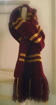 a harry potter scarf hanging on the wall