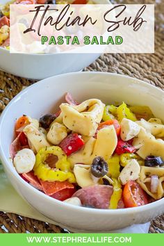 pasta salad in a white bowl on a woven placemat with text overlay that reads italian sub pasta salad