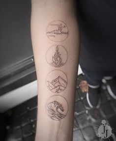 a person with a tattoo on their arm showing four different types of fire and water