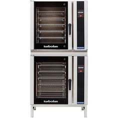 two ovens sitting side by side on top of each other