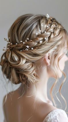 a woman with braids and pearls in her hair is wearing a wedding dress to the side