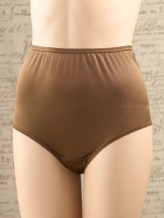 These nylon briefs are designed to offer a no-bunch fit and a smooth look under clothing. . . no panty line worries! They have elastic at the waist and leg openings and a cotton-lined crotch for added comfort. Three pairs per package. 1/2" wide elastic waist and leg bands Cotton-lined crotch Silky-soft nylon Designed to stay in place Smooth silhouette — no panty lines 3 pairs full briefs 100% nylon Machine wash and dry Imported Exclusive to The Vermont Country Store | Women's Nylon Full Briefs, Solid Color Brief Shapewear Bottoms, Supportive Solid Color Shapewear Bottoms, Supportive Solid Color Smoothing Bottoms, Solid Stretch Shapewear Boxer Briefs, Solid Color Stretch Shapewear Boxer Briefs, Stretch Shapewear For Daywear, Shaping High-cut Leg Solid Bottoms, Solid Fitted No-show Boxer Briefs, High Waist Elastic Nylon Bottoms