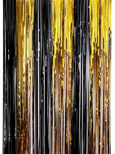 an abstract painting with gold and black stripes