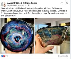 someone is holding up a bowl that looks like it has been painted with blue and red