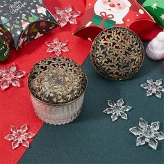 some christmas decorations are laying out on the table