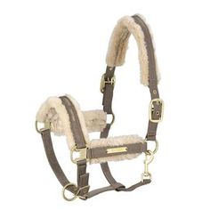 the bridle is made with sheepskins and has two metal buckles