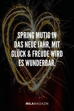 a heart made out of sparkles with the words spring mutig in da'neu jahr, mit gluck & freue wird es wunderbar