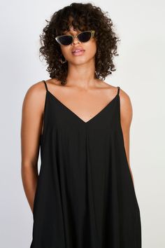 Black V neck floaty midi dress Elegant V-neck Sundress For Day Out, Chic V-neck Midi Dress For Date Night, V-neck Maxi Sundress For Day Out, Flowy Midi Dress For Day Out, V-neck Sundress For Night Out, Chic V-neck Maxi Dress For Date Night, Maxi Length V-neck Dress For Date Night, Casual V-neck Maxi Dress For Date Night, Chic V-neck Rayon Maxi Dress