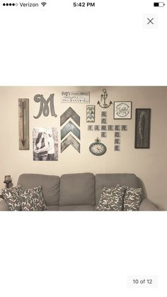 a living room filled with furniture and lots of pictures on the wall above it's couch