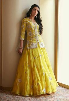 Editor's Note Featuring Yellow Nargis Lehenga Set with Hand Embroidered, French Knots, Aari, Appliques Fabric: Organza Silk Color: Yellow Care: Dry Clean Only About the Designer A melange of ri... Haldi Function, Kurta Lehenga, Function Dresses, Lehnga Dress