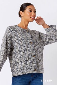 Discover sophistication and warmth with our Sienna Tweed Jacket. A must-have in your winter capsule wardrobe, this womens blazer jacket combines style and comfort for cold weather outfits. Upgrade your workwear game by incorporating this chic piece into your collection. Craft elegant womens work outfits effortlessly and stay cozy while looking sharp.