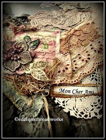 an old lace doily with the words mon cher ami on it and some flowers