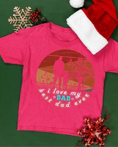 a pink t - shirt with the words i love my father and dad on it