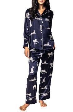 Exude elegance through your morning and nighttime routines in these luxurious silk pajamas featuring a fierce print framed in classic piping. 26 1/2" top length; 29 1/2" inseam; 17 1/2" leg opening; 11" front rise; 16" back rise (size Medium) Top has front button closure; notched collar; chest patch pocket; long sleeves Pants have elastic/drawstring waist 100% silk Hand wash, dry flat Imported Silk Pajama Pants, Silk Robe Long, Silk Pajama, Lace Trim Shorts, Silk Pajama Set, Long Sleeve And Shorts, Striped Pyjamas, Silk Shorts, Silk Pajamas