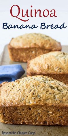 three banana breads sitting on top of a baking sheet with the title, quinoa banana bread