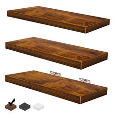 three wooden shelves with metal brackets on each side and one shelf above the other, in different sizes