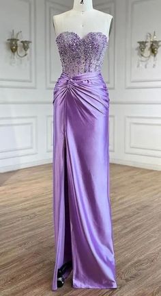 Made to Order Stunning Lilac Strapless Beaded Sweetheart Neck Corset Gathered Satin Gown. If you're looking for that unique sparkly statement piece, you have found it!  Production time is between approx 6-8 weeks. * Sizing - All items are made according to measurement ranges, they are NOT typical letter or numeric sizing. It is imperative to compare your exact measurements with the size chart provided either in the listing photos or item descriptions and to also add your measurements under Personalization. If you have any questions on sizing, please feel free to message me. Do not order your normal size without taking and comparing measurements. * Made to order items such as feather tops, jackets, dresses and rhinestone/crystal dresses are NON-REFUNDABLE/EXCHANGEABLE. If you have a problem Purple Embellished Evening Dress With Sweetheart Neckline, Hot Pink Homecoming Dresses, Crystal Dresses, Homecoming Dresses Bodycon, Satin Long Prom Dress, Rustic Wedding Gowns, Sequin Homecoming Dress, Neck Corset, Crystal Dress