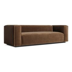 a brown couch sitting on top of a white floor