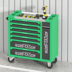 a green work station with tools on it