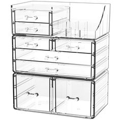 three clear drawers stacked on top of each other