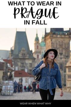 a woman walking in front of a castle with the words what to wear in prague in fall