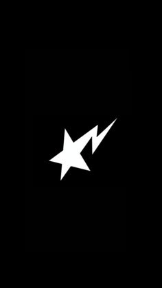 a black and white logo with an arrow pointing to the right, on a dark background