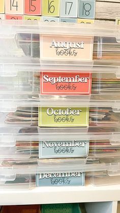 the drawers are filled with many different types of files and folders in plastic bins