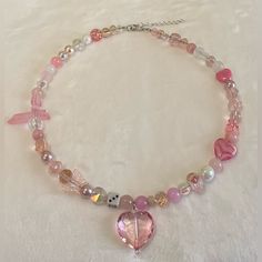 Handmade Necklace Materials Used: -Glass Beads -Crystal Heart -Crystal Pink Handmade Jewelry, Hand Beaded Necklace, Multi Strand Beaded Necklace, Key Pendant Necklace, Black Bead Necklace, Long Chain Necklace, Summer Necklace, Pink Necklace, Cabochon Pendant