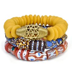 This African bracelet set will definitely turn heads! The handmade glass krobo bead bracelet set is a must have! This will be a great product to add to your collection! Get all 3 for less! Measurement: 8.5in circumference Hardware:  Krobo Glass Beads, Brass Beads and wood beads Color: Yellow, red, gold and brown African Beaded Bracelets, African Bracelet, African Brass Beads, African Bracelets, Red And Brown, Brass Beads, Beads Bracelet Design, Big Girl Fashion, Bead Set