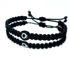 Hand-Made Black String Bracelet With An Evil Eye For Wrist Sizes 6 To 9 Inches, With An Easy To Use Zip Like Function To Fit Your Wrist. Made From High Quality Black String, It Will Be Sure To Last. Wearing An Evil Eye As An Amulet Is Believed To Provide Protection Against Evil Forces. The Evil Eye Meaning Has Symbolism In Almost Every Country In The World And In Every Religion. Each Bracelet Is Carefully Handcrafted And Give Proper Time To Ensure Quality. Evil Eye Meaning, Black String Bracelet, Protection Against Evil, Eye Meaning, Black Bracelets, Eye Bracelet, String Bracelet, Evil Eye Bracelet, Womens Jewelry Bracelets