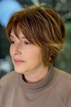 Layered warm auburn shag haircut with side-swept bangs Short Hairstyles Over 50, Short Hair Images