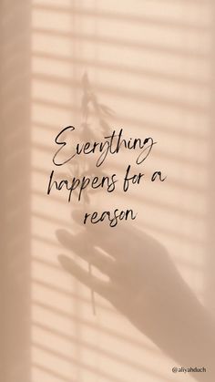 someone's hand with the words everything happens for a reason