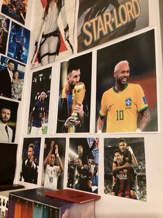 a wall covered with pictures and photos of soccer players, including the star - lord