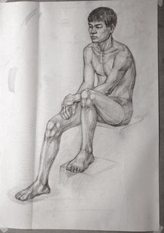 a pencil drawing of a man sitting on the ground