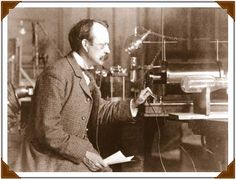 an old photo of a man working in a lab