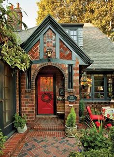 a brick house with a red front door